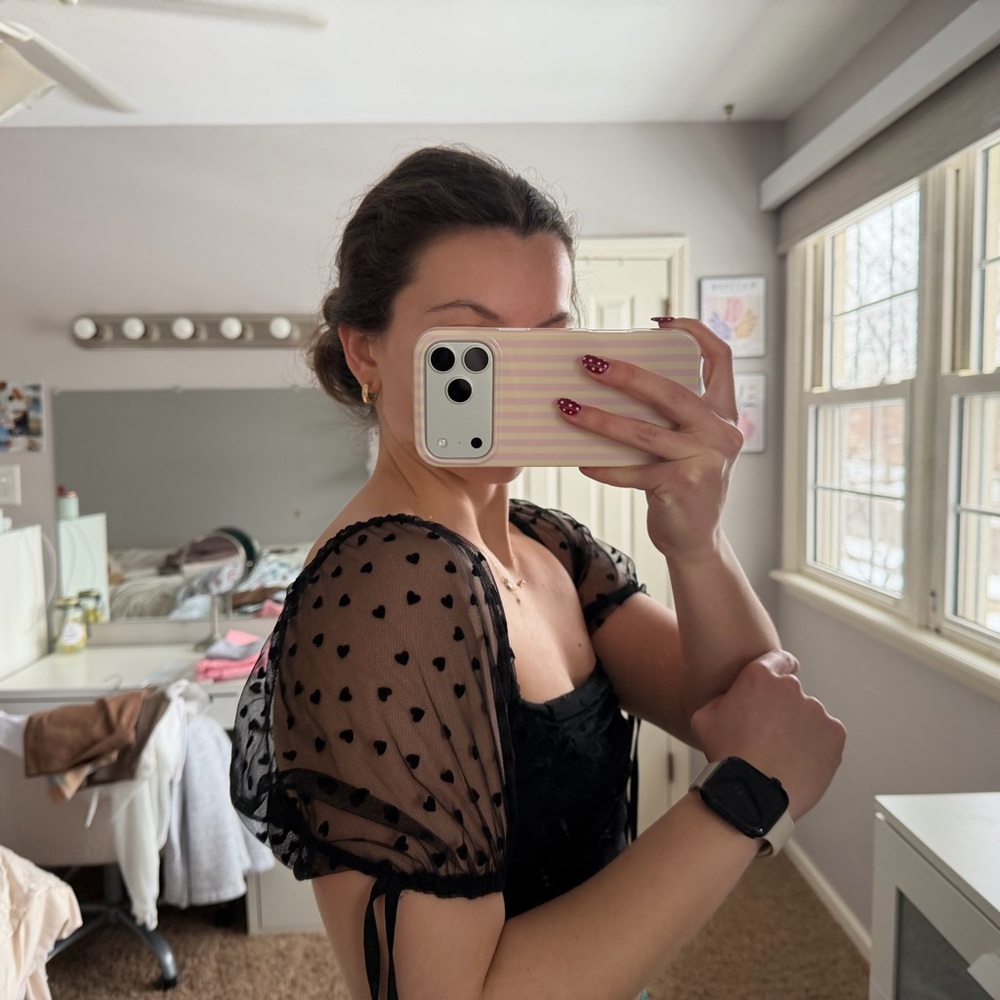 Elegant Black Sheer Sleeve Top with heart detailing